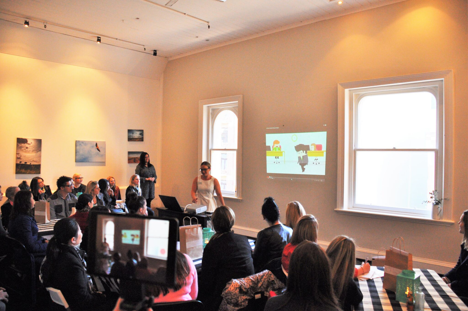 Jodie Coall running a workshop for a full room of business owners and practitioners